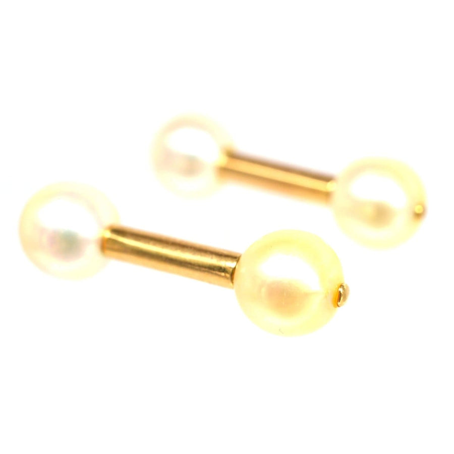 1940s French 18ct gold cufflinks featuring cultured pearls, elegant vintage accessories for crisp cuffs.