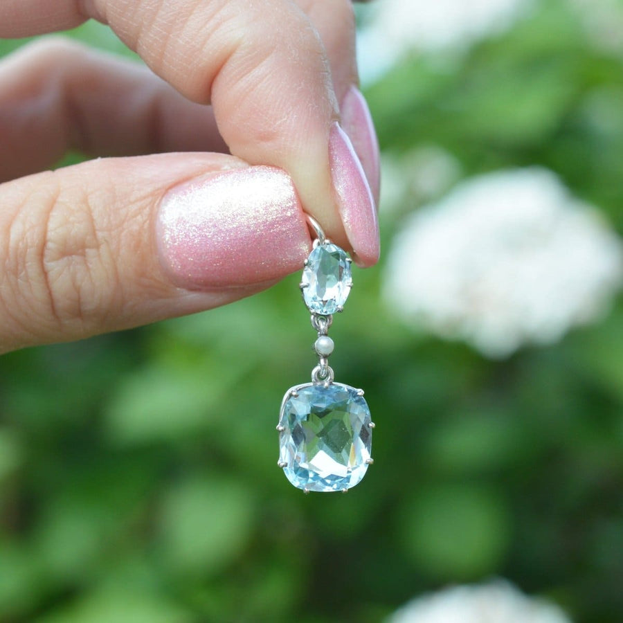 1940s platinum aquamarine and pearl drop pendant, showcasing stunning blue stones and elegant design.
