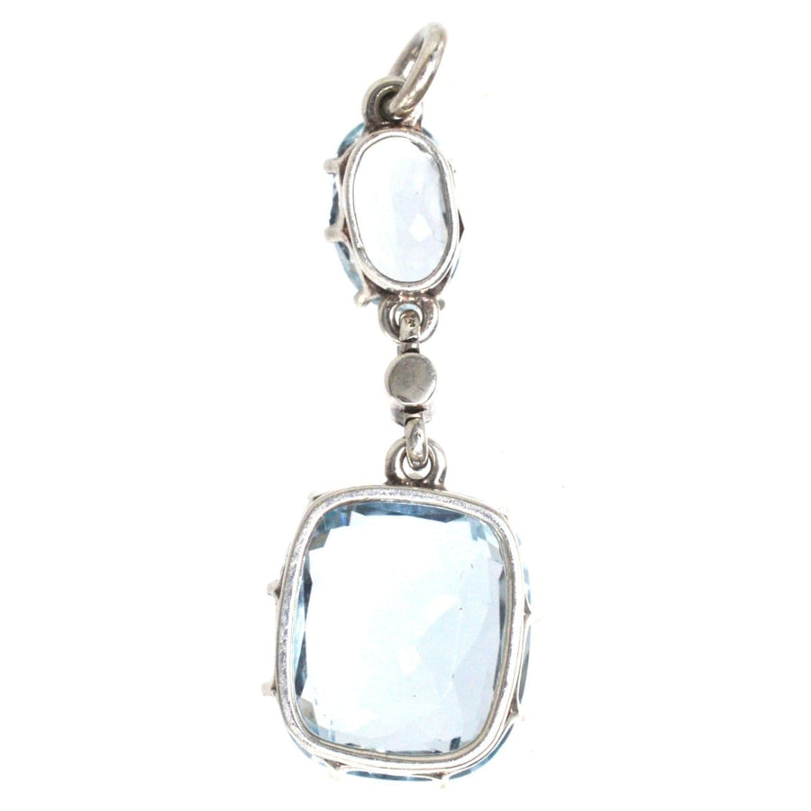 1940s platinum aquamarine and pearl drop pendant with a stunning blue aquamarine stone.