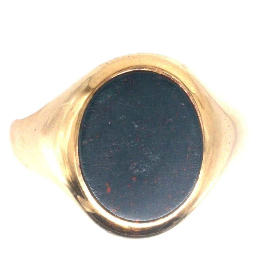 1960s 9ct gold signet ring featuring a deep bloodstone, perfect for engraving or stylish wear.