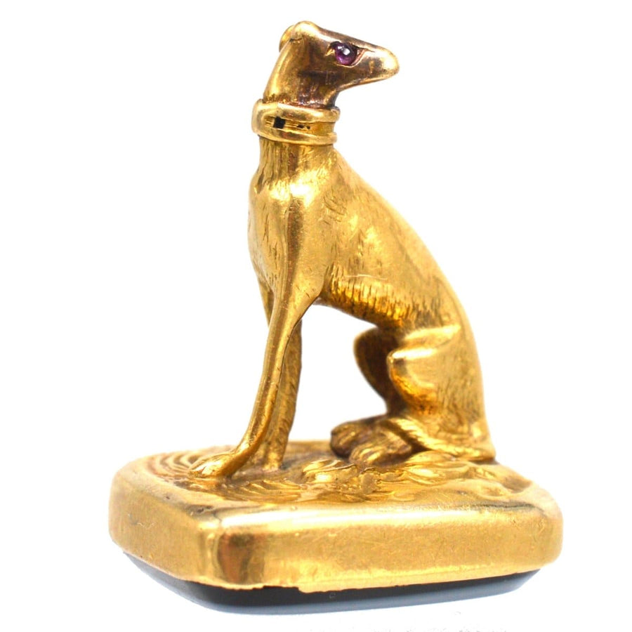 19th century 15ct gold whippet pendant with sardonyx seal and red stone eyes, unique dog charm.