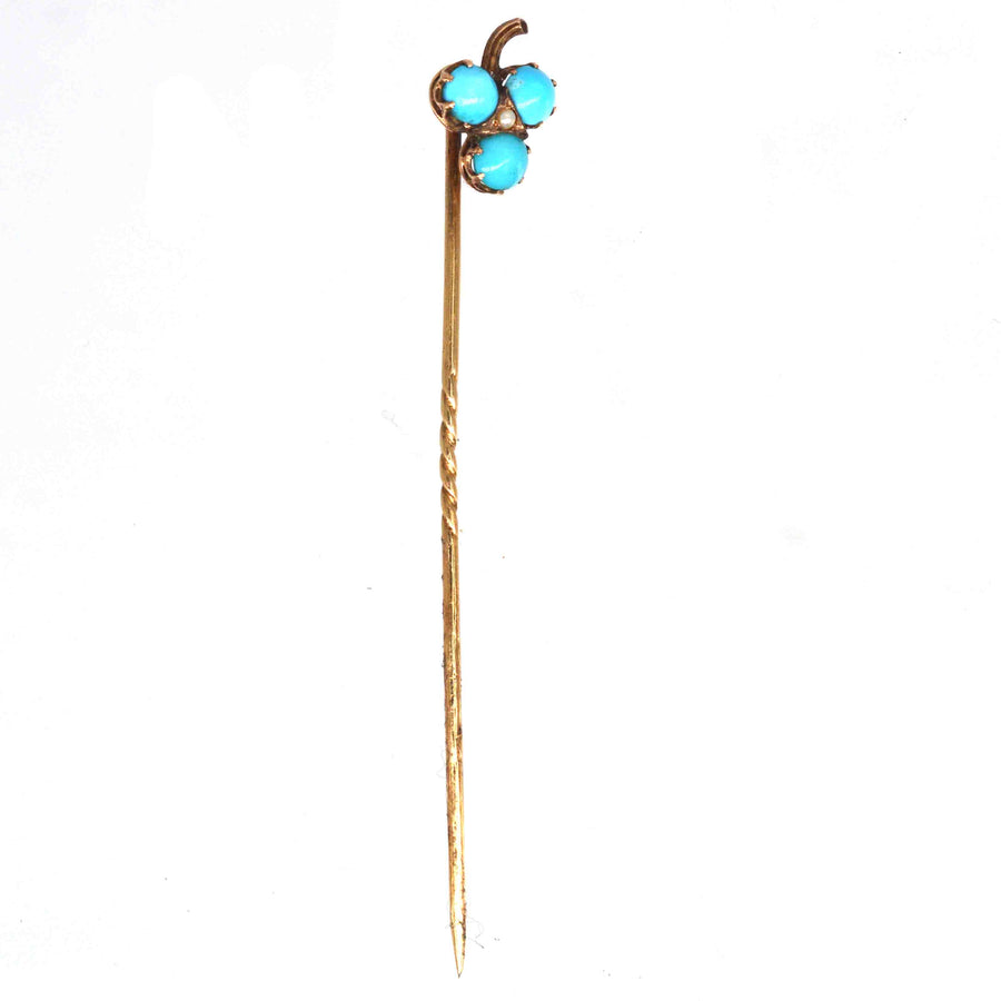 Edwardian 9ct gold shamrock tie pin with turquoise beads and pearl, a stylish and lucky accessory.