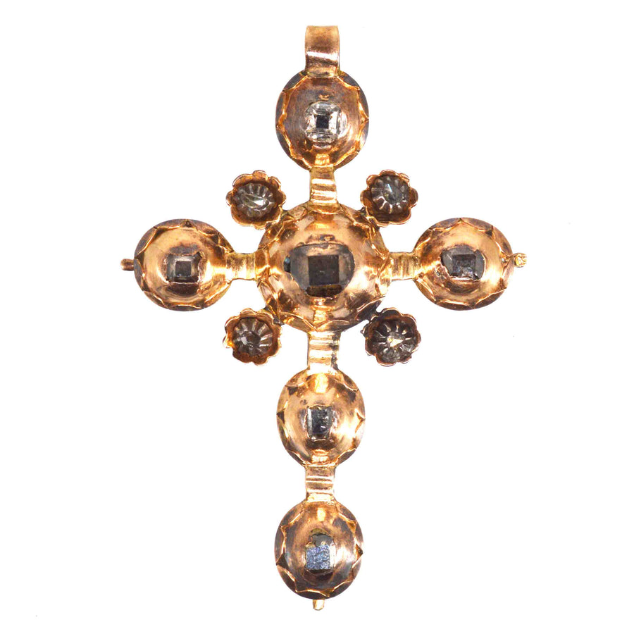 Early Georgian gold cross pendant set with table-cut and rose-cut diamonds, circa 1720, showcasing classic 18th-century design.