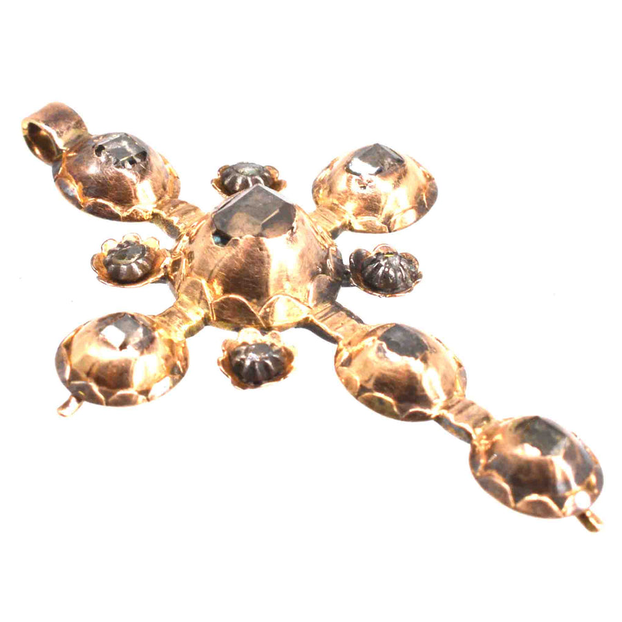 Early Georgian gold cross pendant adorned with table-cut and rose-cut diamonds, circa 1720.