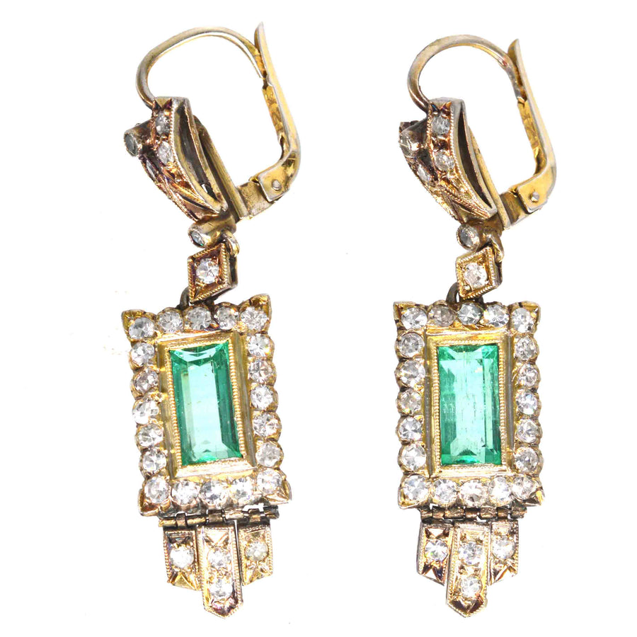 Art Deco 18ct gold drop earrings with emeralds and diamonds, showcasing vintage glamour and elegance.