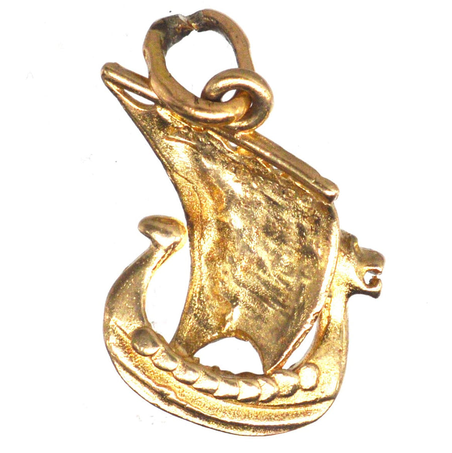 Vintage 9ct Gold Viking Ship Charm featuring a dragon head, a unique 1977 jewelry piece symbolizing Norse culture.