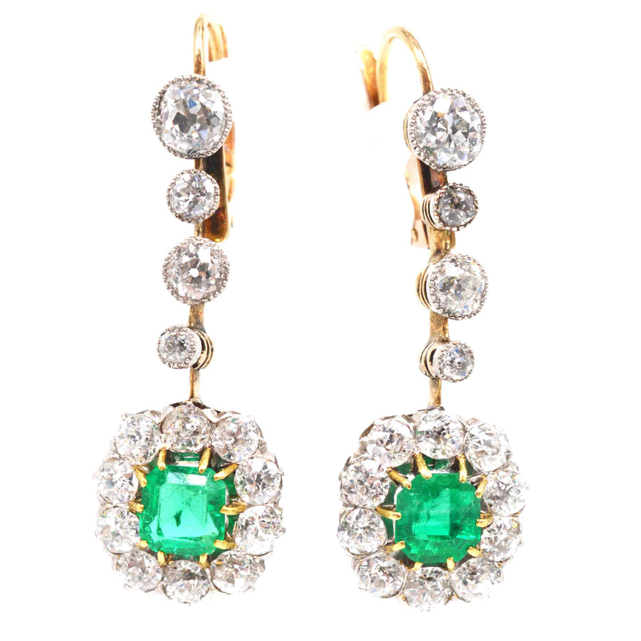 Edwardian emerald and diamond drop earrings, featuring Colombian emeralds and Old European Cut diamonds in gold and platinum.