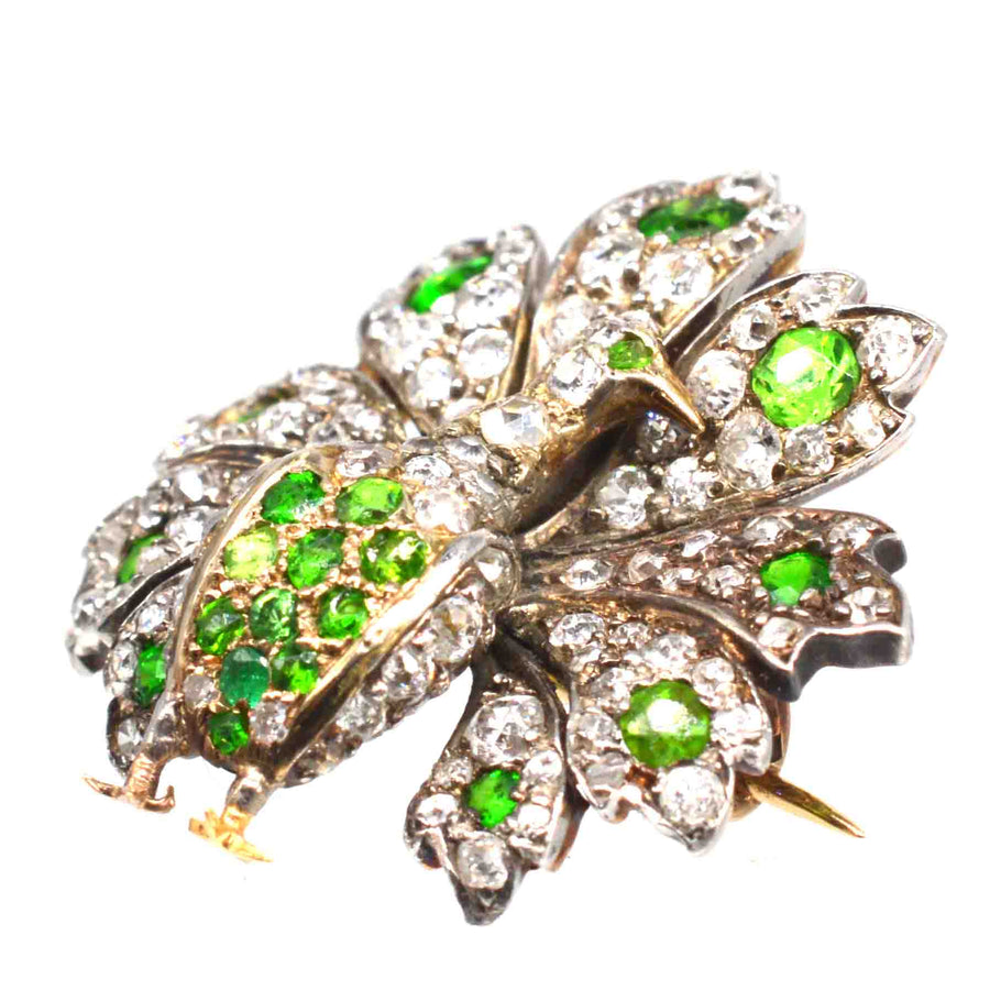 French Belle Epoque 18ct gold peacock brooch with green demantoid garnets and diamonds, showcasing exquisite craftsmanship.