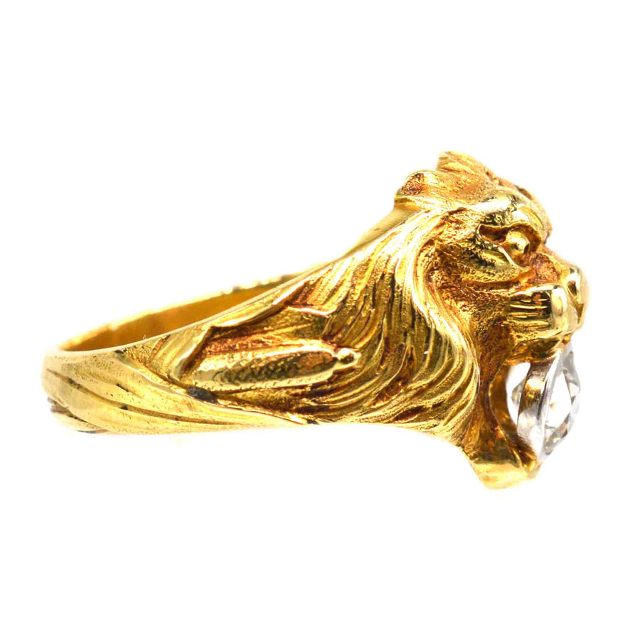 French Art Nouveau 18ct gold lion ring with diamond, showcasing intricate details and fierce expression.