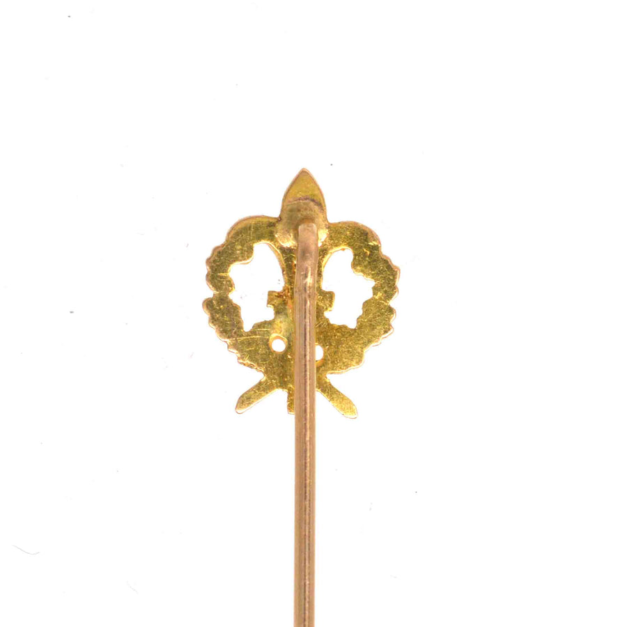 Edwardian 18ct gold tie pin featuring a fleur-de-lis design, perfect for adding elegance to any tie or lapel.