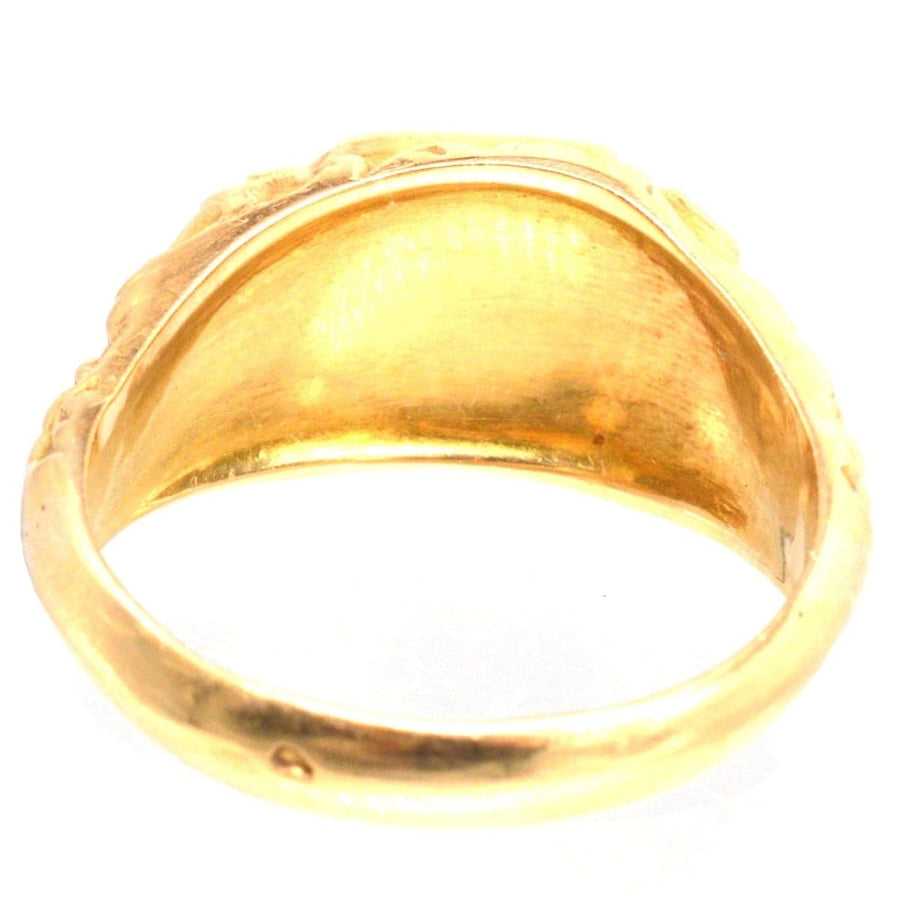Interior view of Antique French 18ct gold ring showcasing intricate rose engravings and buttery gold finish.