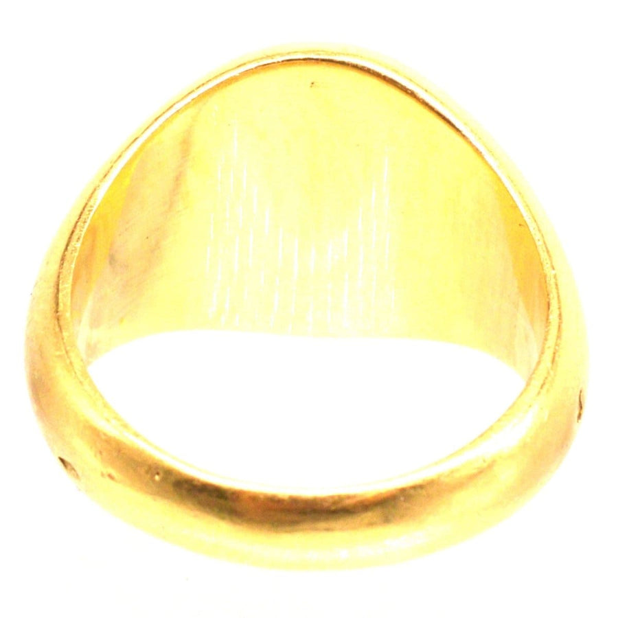 Interior view of an antique French 18ct gold signet ring, showcasing its exquisite buttery gold finish.