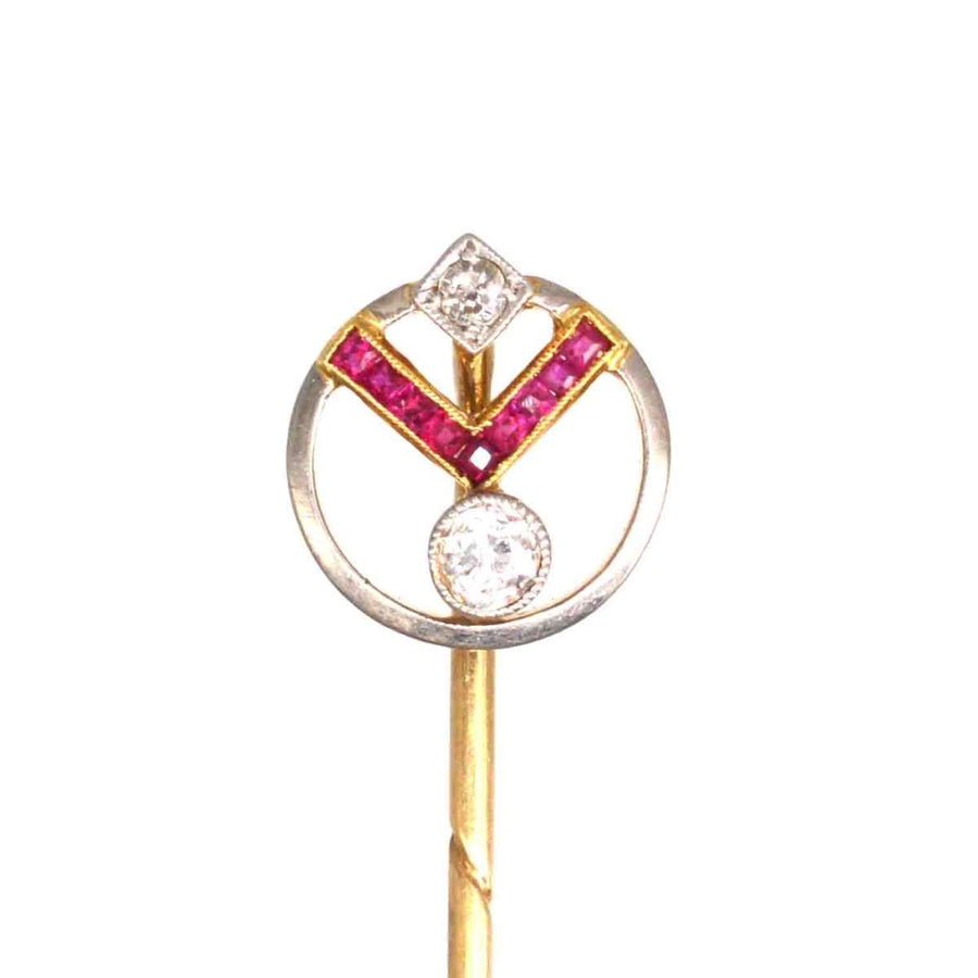 Art Deco 14ct gold pin featuring ruby and diamond geometric design, embodying vintage elegance from the 1920s.