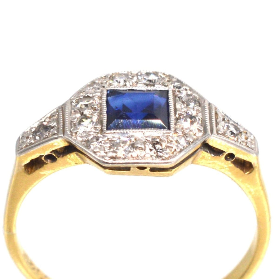 Art Deco 18ct and platinum ring with square cut sapphire and diamond accents, perfect for engagement or September birthdays.
