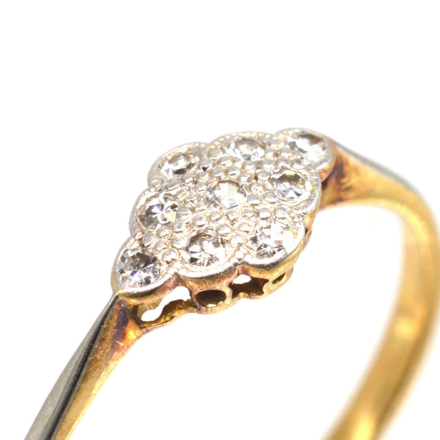 Art Deco 18ct gold diamond cluster ring featuring nine sparkling diamonds in an elegant design, perfect for engagement.