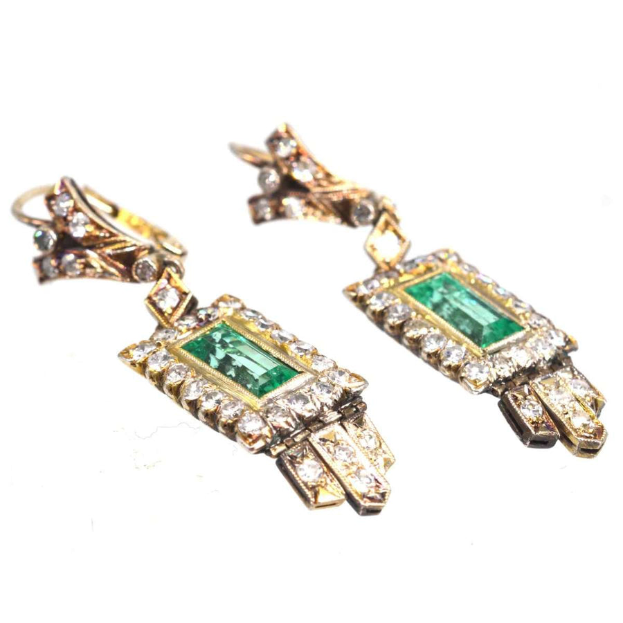 Art Deco 18ct gold drop earrings with emerald and diamond, showcasing 1920s geometric elegance.