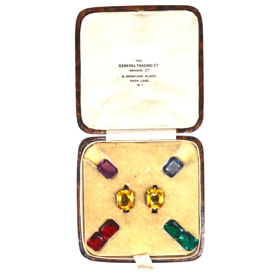 Art Deco interchangeable earrings set featuring colorful paste stones in original General Trading Company case.