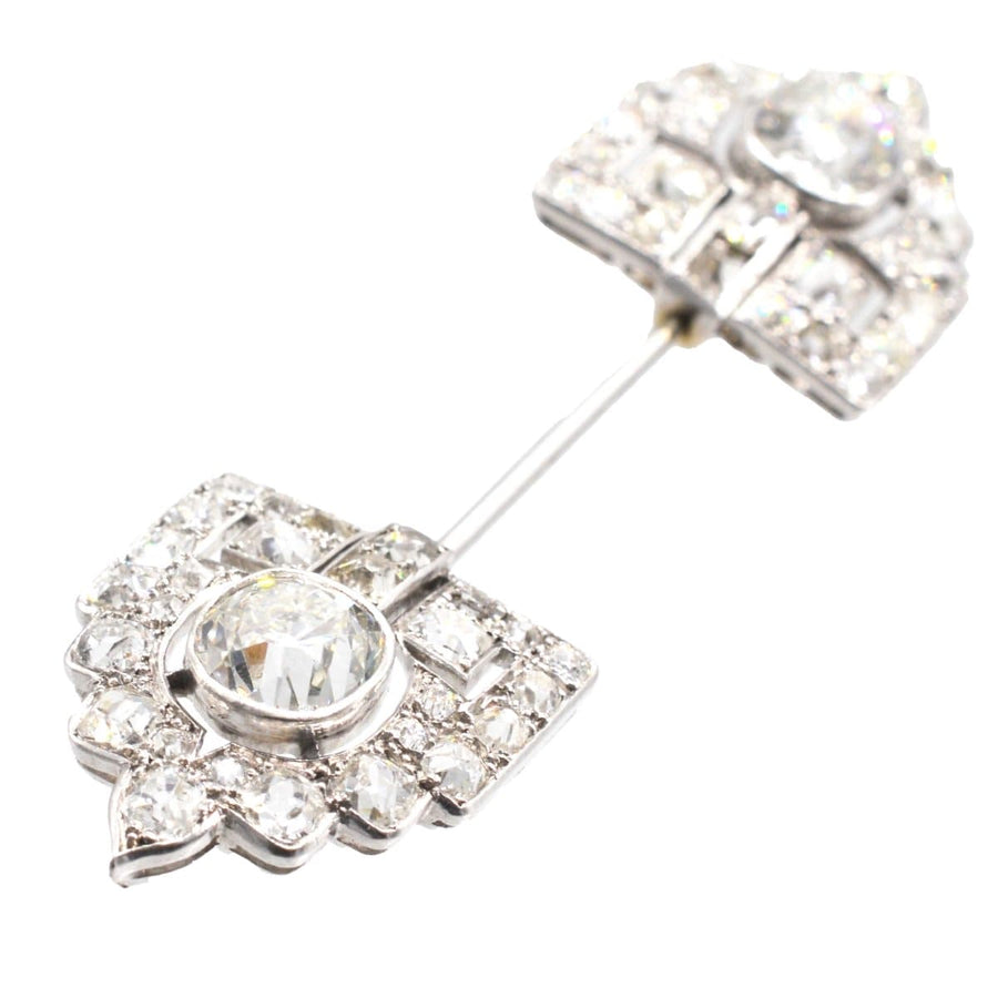 Art Deco platinum jabot brooch featuring two old European cut diamonds and over 6 carats of sparkling diamonds.