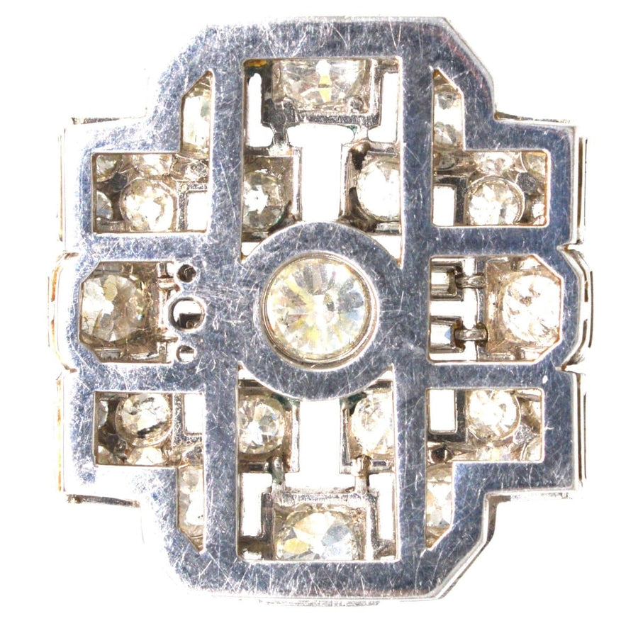 Art Deco platinum brooch featuring 7 carats of diamonds in a geometric design, with original case and pearl necklace attachment.