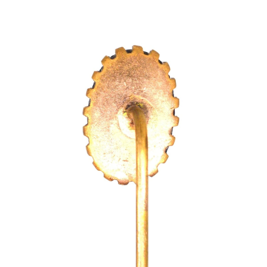 Back view of an Art Deco stickpin with a textured oval base for secure attachment, perfect for elegant ties.