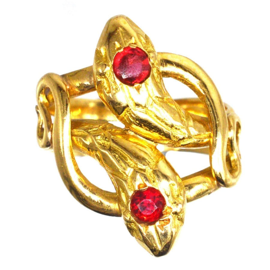 Belle Epoque antique 18ct gold double snake ring with ruby and garnet symbolizing eternal love.