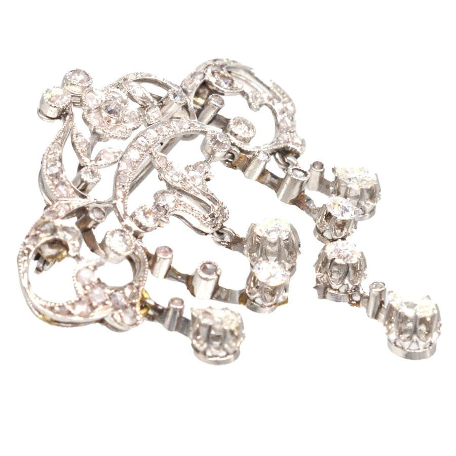Vintage Belle Epoque 18ct white gold diamond brooch and pendant with floral motifs and pear-shaped drops.