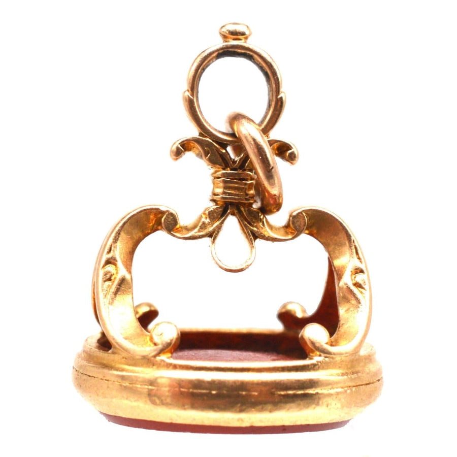 Early 19th century gold seal with carnelian intaglio depicting a Roman man, likely from the Grand Tour.