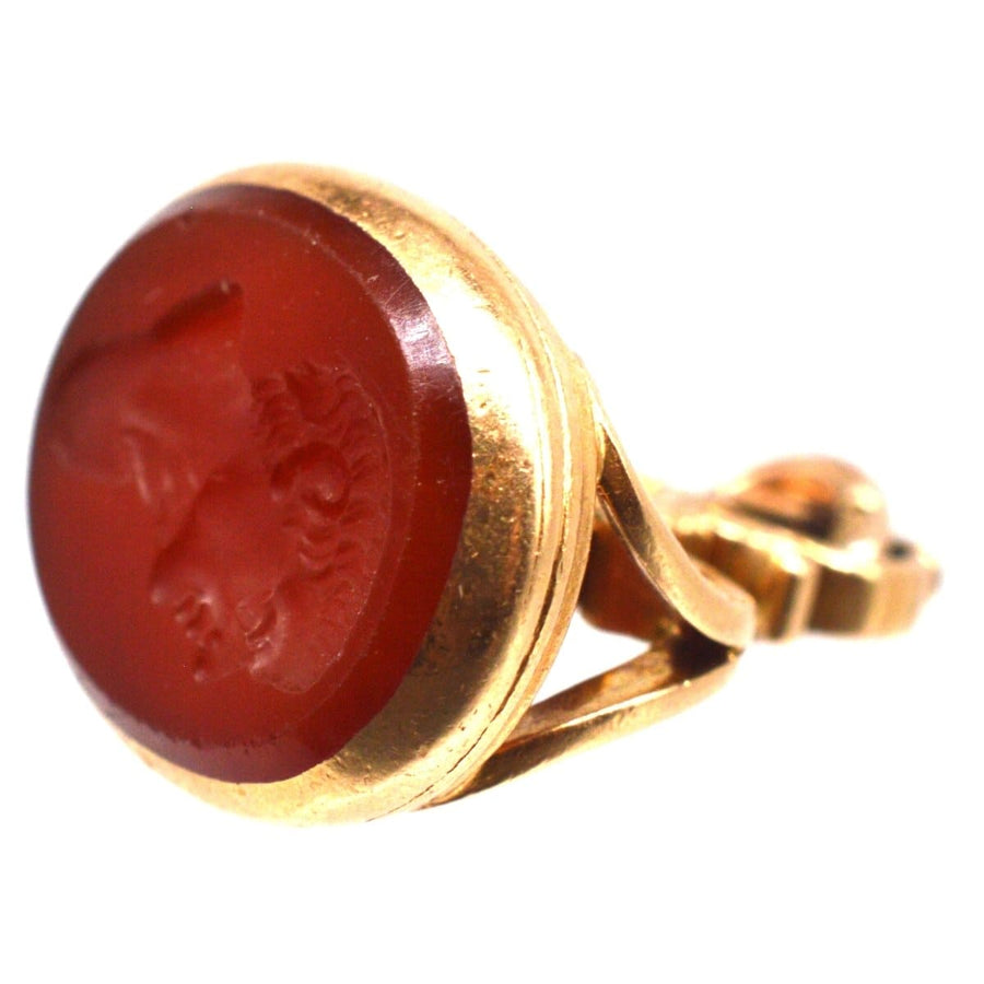 Early 19th century gold seal featuring a carnelian intaglio of a Roman man, dating to the 1820s.