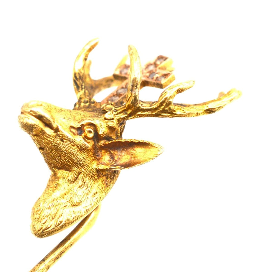 14ct gold St. Hubertus stag tie pin with detailed antlers and rose diamond accents.