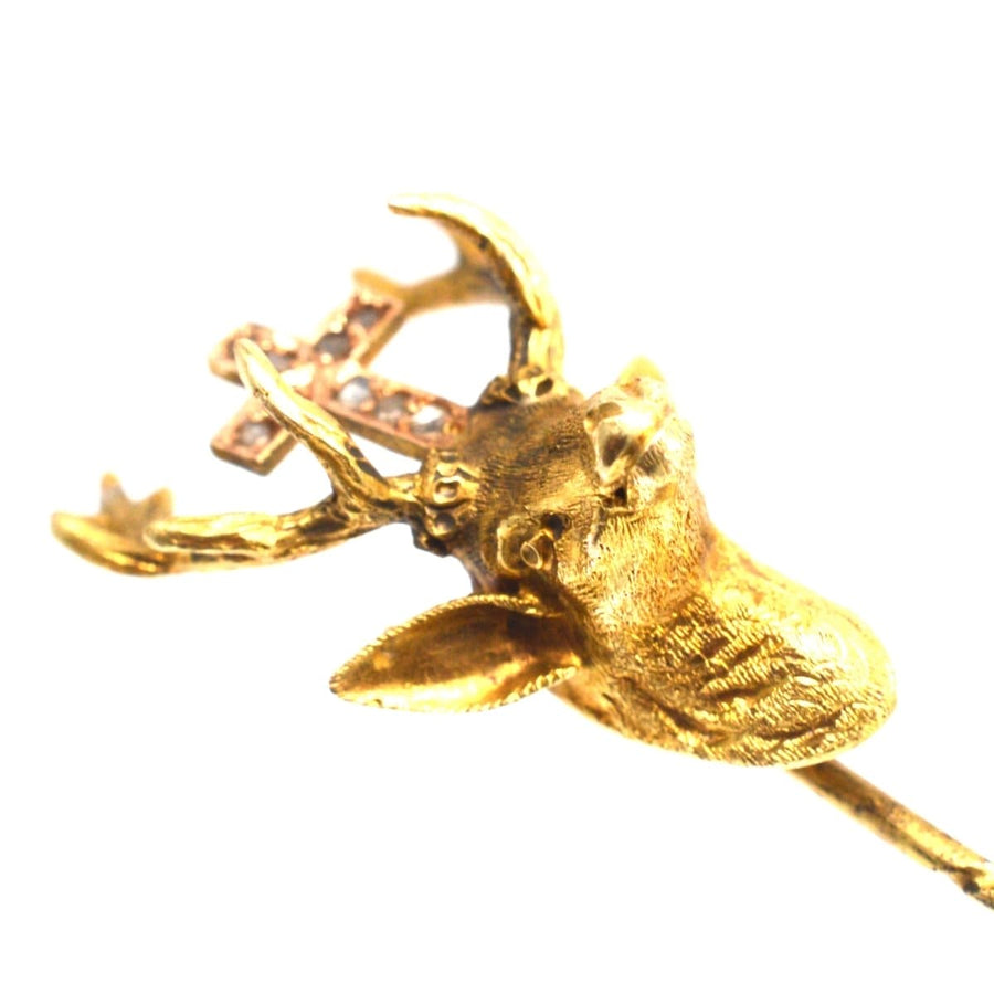 Early 20th century gold tie pin featuring St. Hubertus stag and rose cut diamonds, elegant vintage accessory