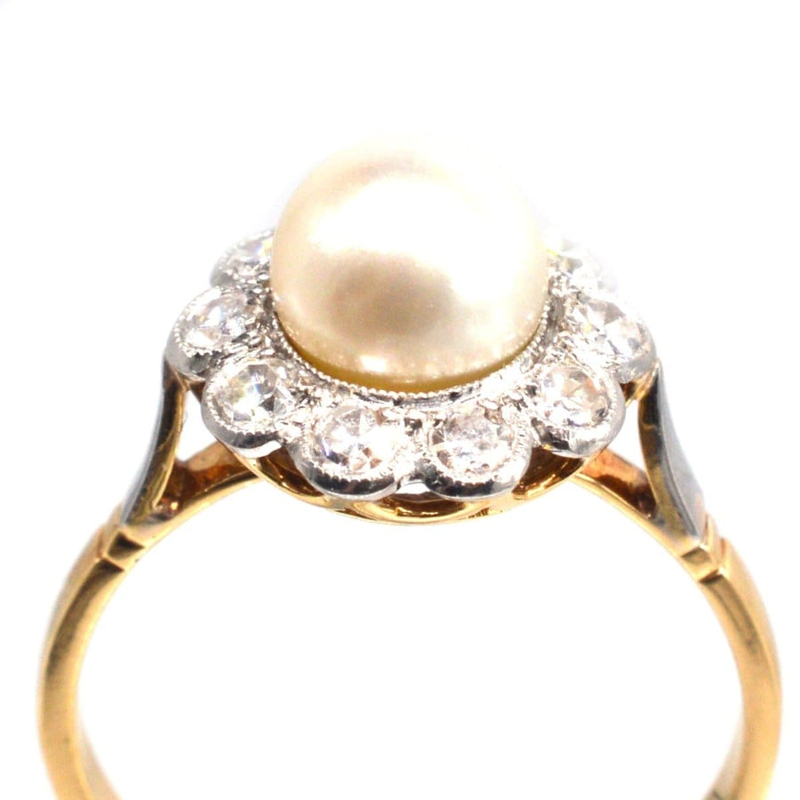 Early 20th century French pearl and diamond cluster ring with 18ct gold and platinum setting.