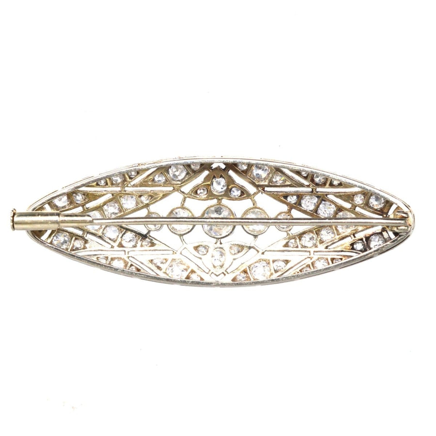 Early 20th Century French platinum and gold diamond brooch with geometric design and 1.6 carats of diamonds.