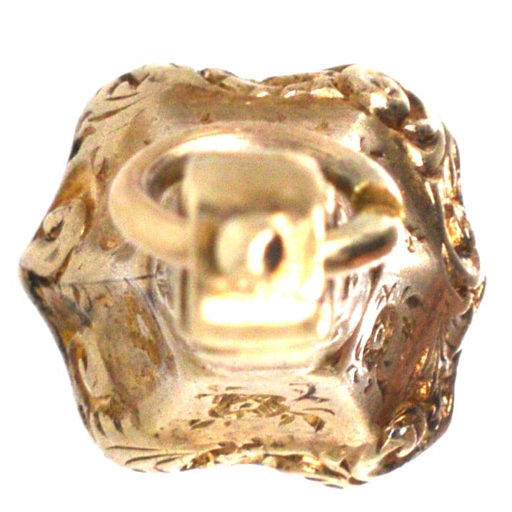 Early Victorian gold cased seal with citrine intaglio featuring floral designs and doves, symbolizing love and grace.