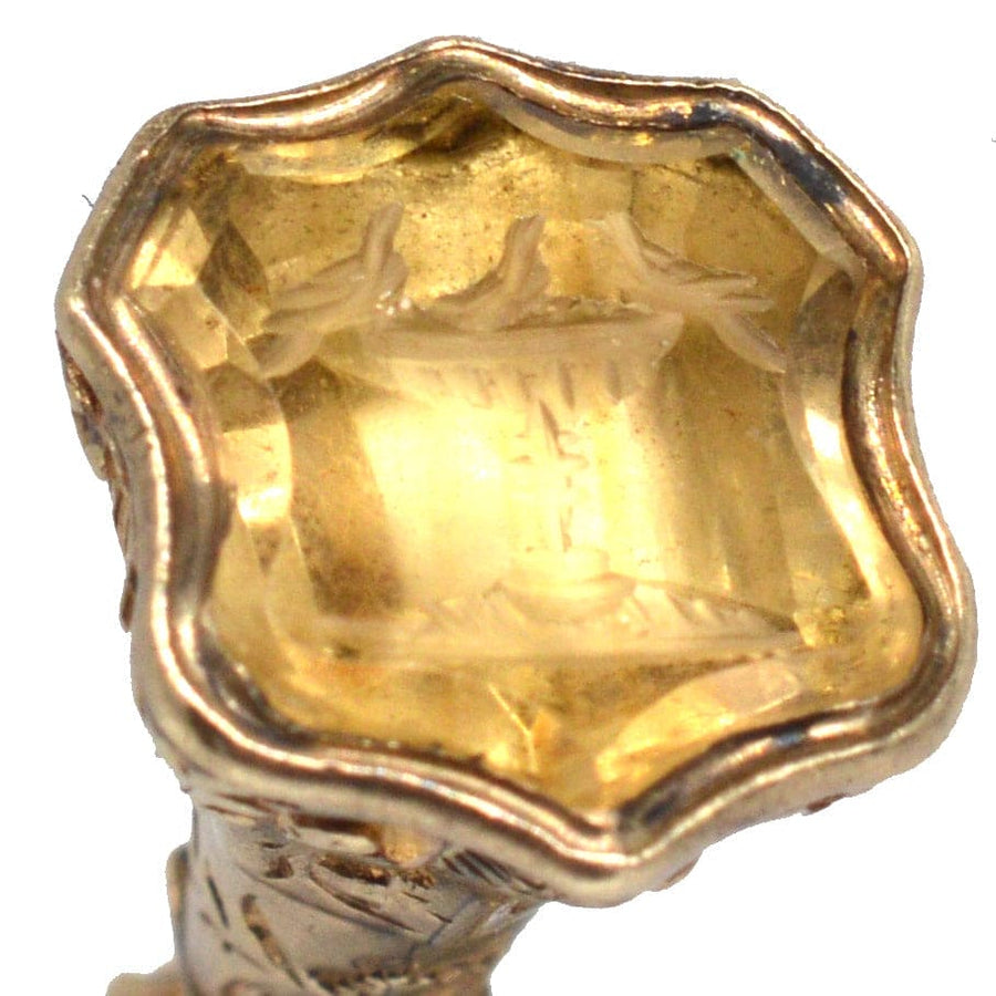 Early Victorian gold seal featuring citrine intaglio of doves on a bird bath with floral design.