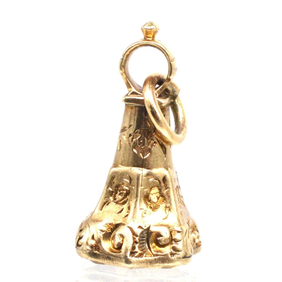 Early Victorian gold seal featuring intricate floral designs and a loop for attachment.