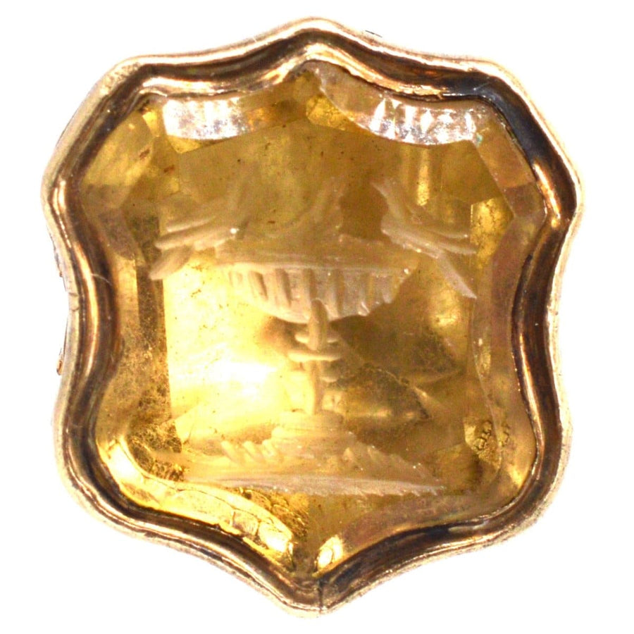 Early Victorian gold seal with citrine intaglio depicting doves on a bird bath, symbolizing love and grace.