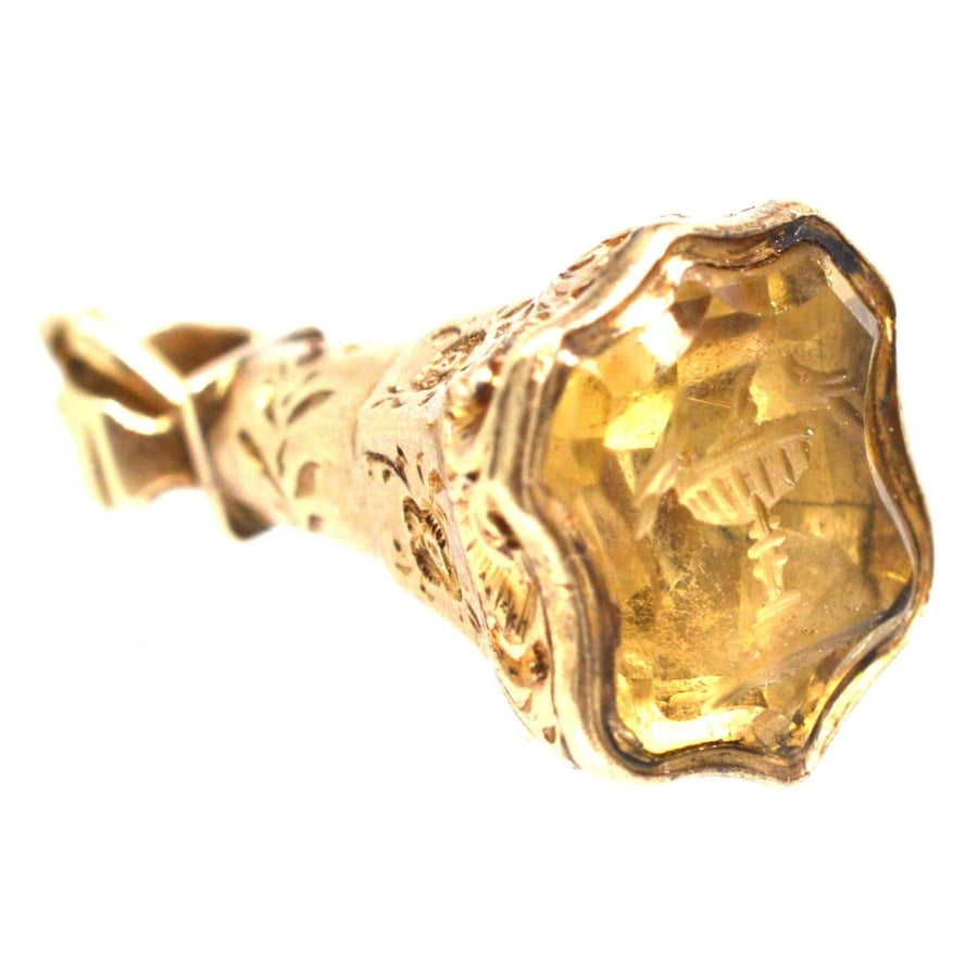 Early Victorian gold seal featuring intricately carved floral designs and citrine intaglio of doves.