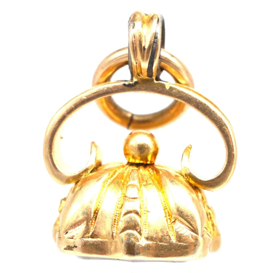 Early Victorian gold seal pendant with intricate detailing, featuring a royal design and historical significance.