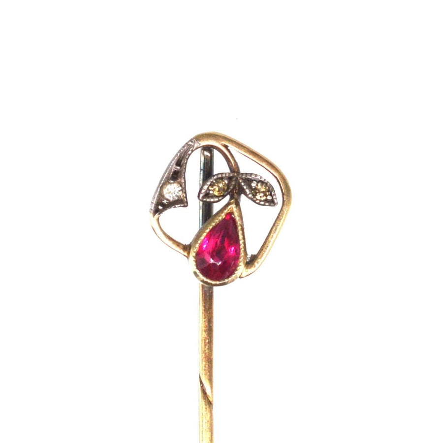 Edwardian 14ct gold tie pin with synthetic red spinel and diamond leaves, made in Austria between 1872-1922.