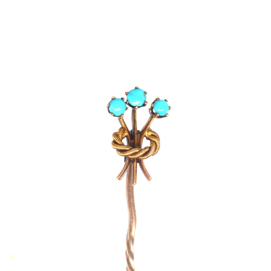 Edwardian 15ct gold tie pin with trio of turquoise stones in knot design, vintage accessory from the 1900s.