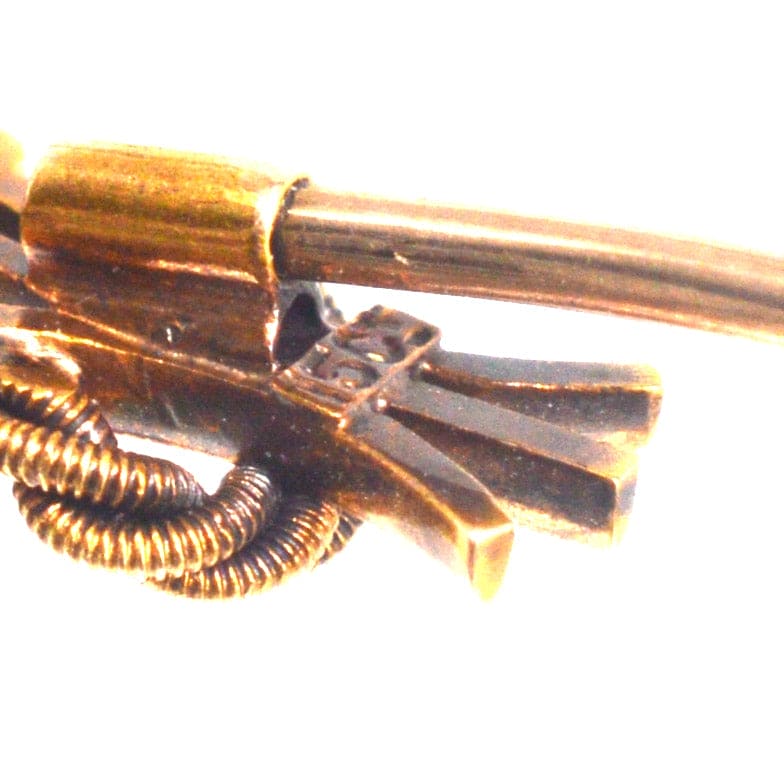 Edwardian 15ct gold tie pin featuring a trio of turquoise stones in a floral knot design.