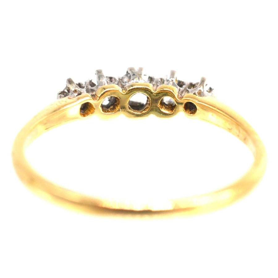 Edwardian 18ct gold and platinum five stone diamond ring, perfect for engagement or special occasions.