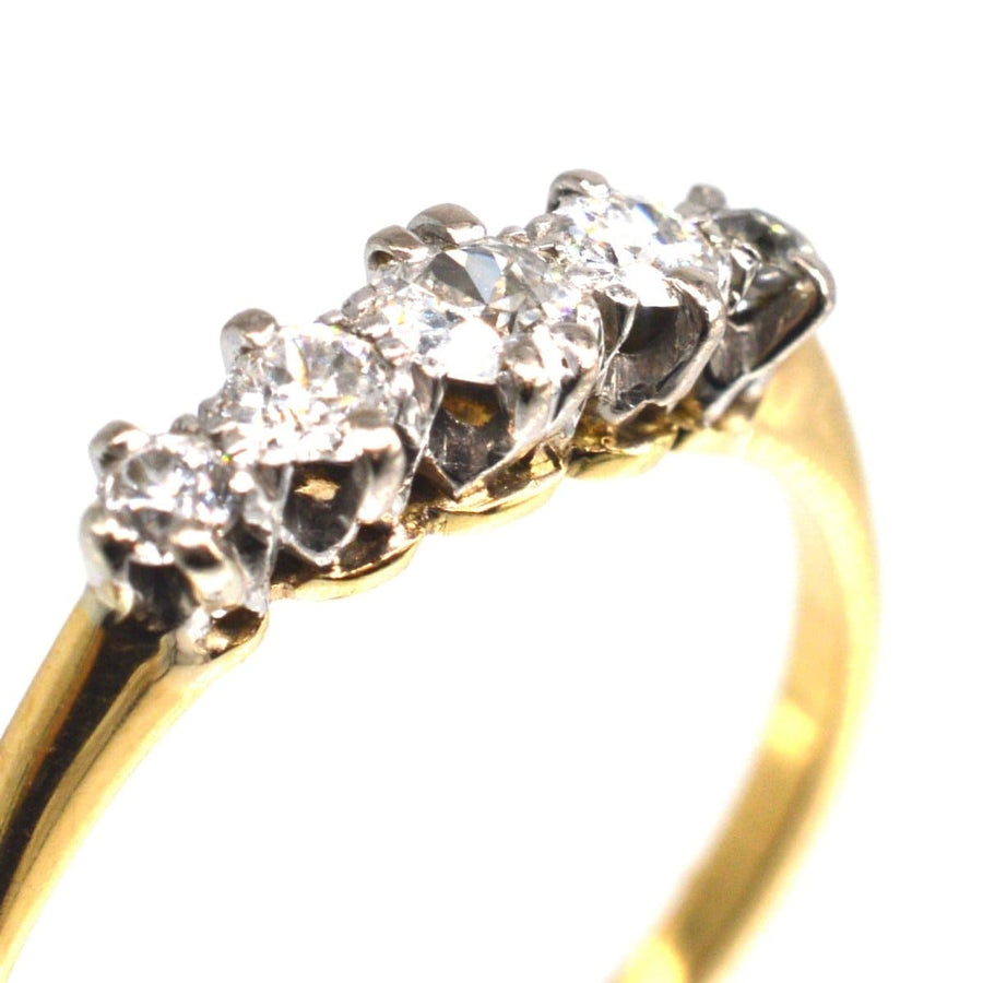 Edwardian 18ct gold and platinum five stone diamond ring, ideal as a stunning engagement ring.