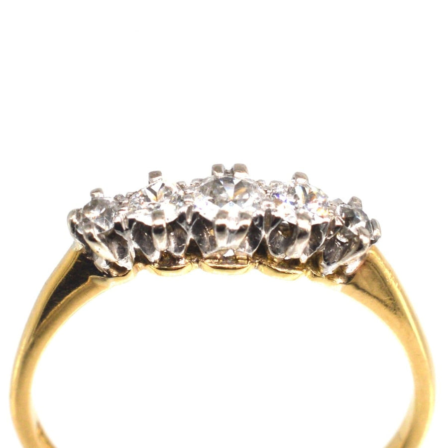 Edwardian 18ct gold and platinum five stone diamond ring, perfect for an engagement or special occasion.