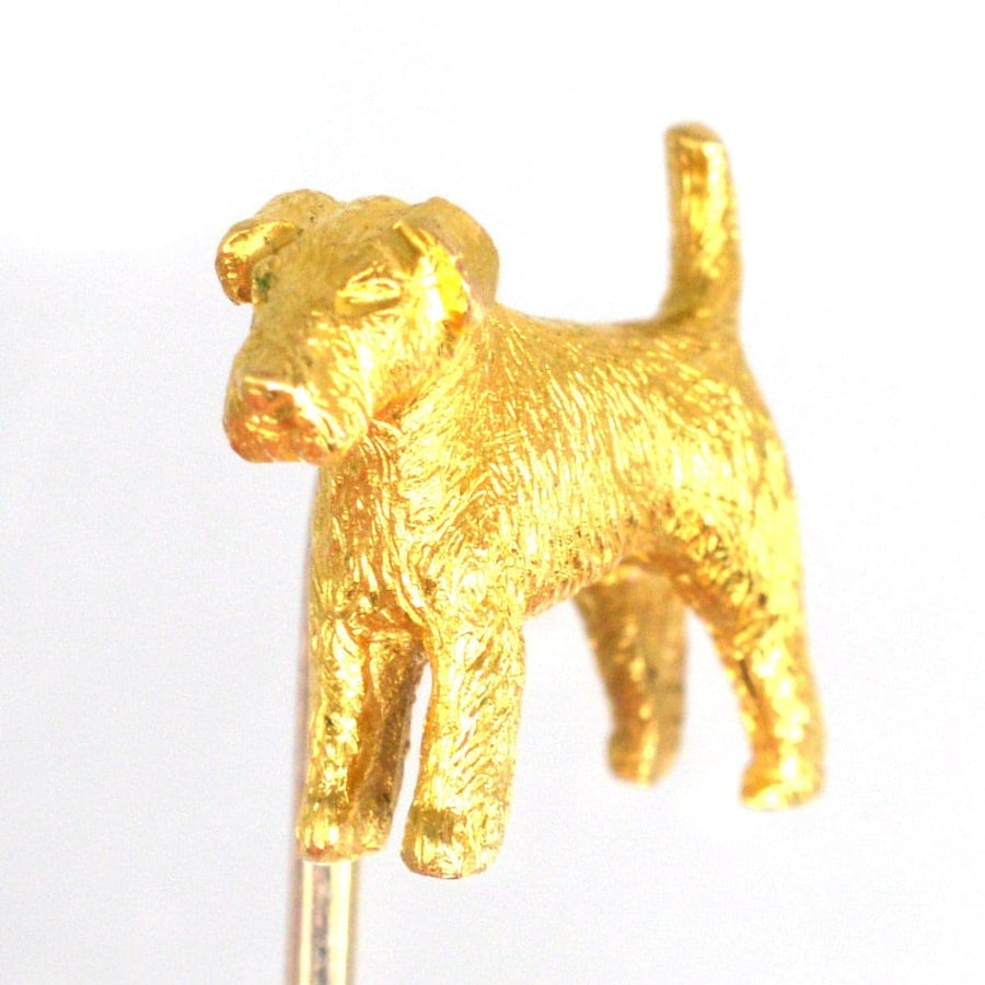 18ct gold terrier dog tie pin crafted in London, featuring a detailed model of a cute terrier.