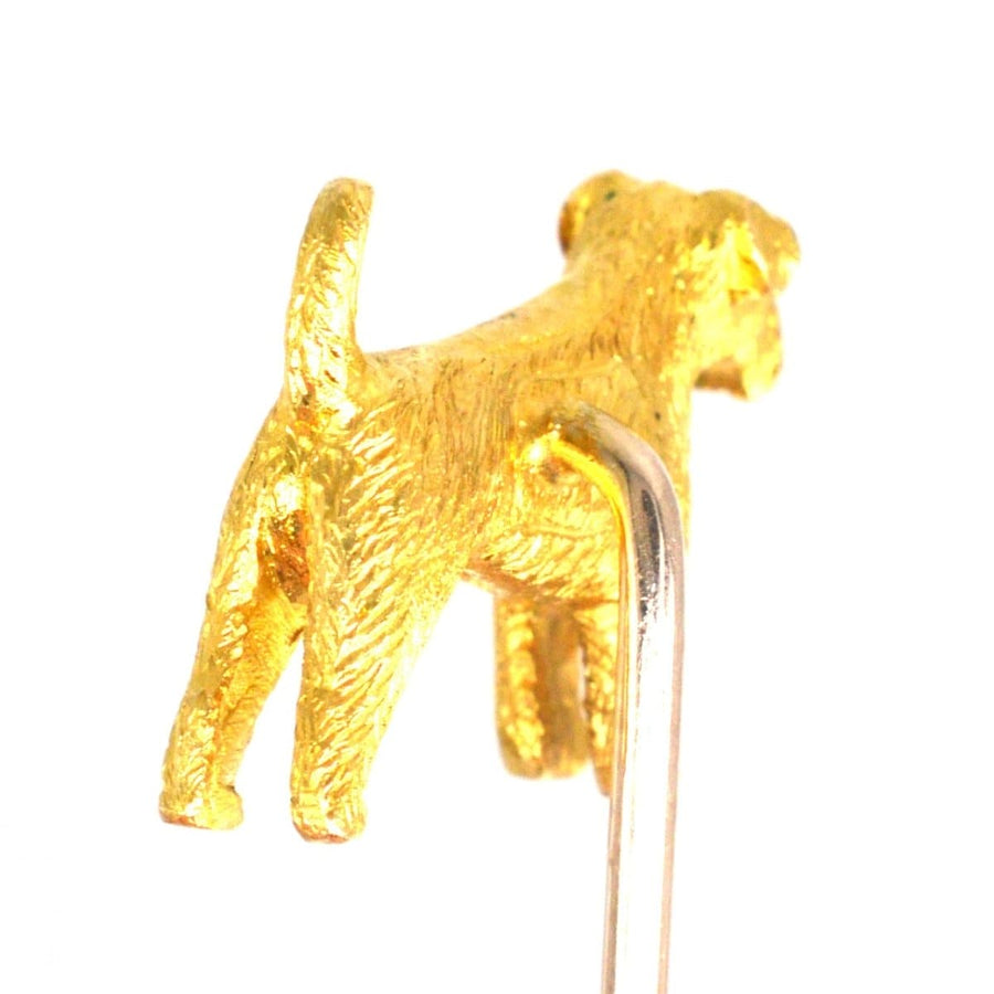 18ct gold terrier dog tie pin made in London, featuring detailed craftsmanship and a cute design.