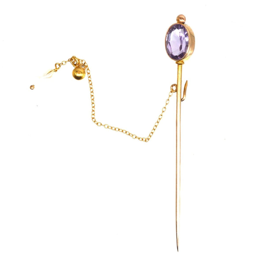 9ct gold tie pin featuring oval purple amethyst and freshwater pearls, with removable chain for versatility.