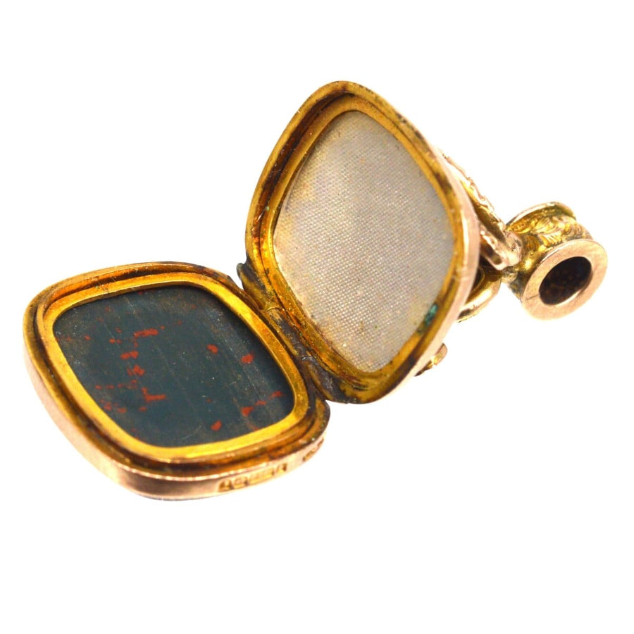Edwardian 9ct gold opening locket seal pendant with bloodstone and photo compartments.