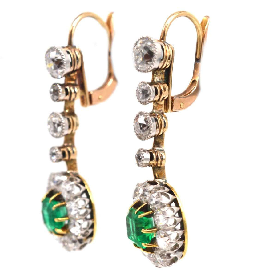 Edwardian Colombian emerald and diamond cluster drop earrings in 18ct gold and platinum.