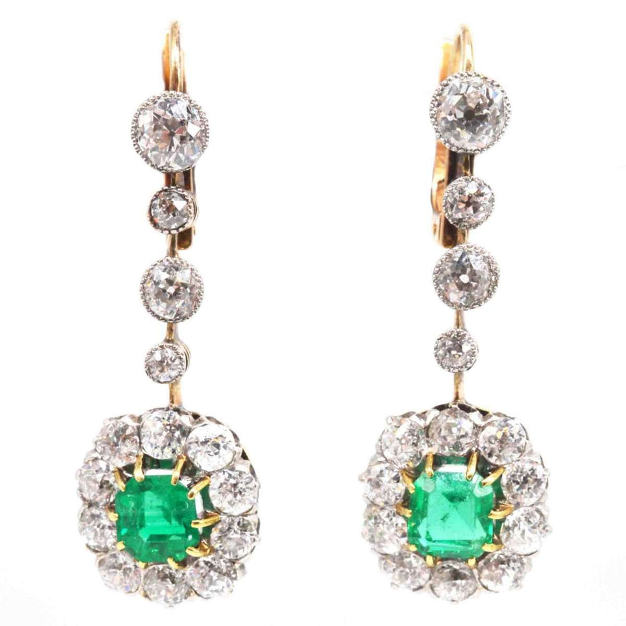 Edwardian emerald and diamond cluster drop earrings with Colombian emeralds and antique diamond accents.